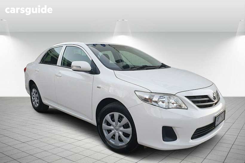 White 2012 Toyota Corolla Sedan Ascent