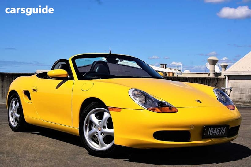 Yellow 2000 Porsche Boxster Roadster