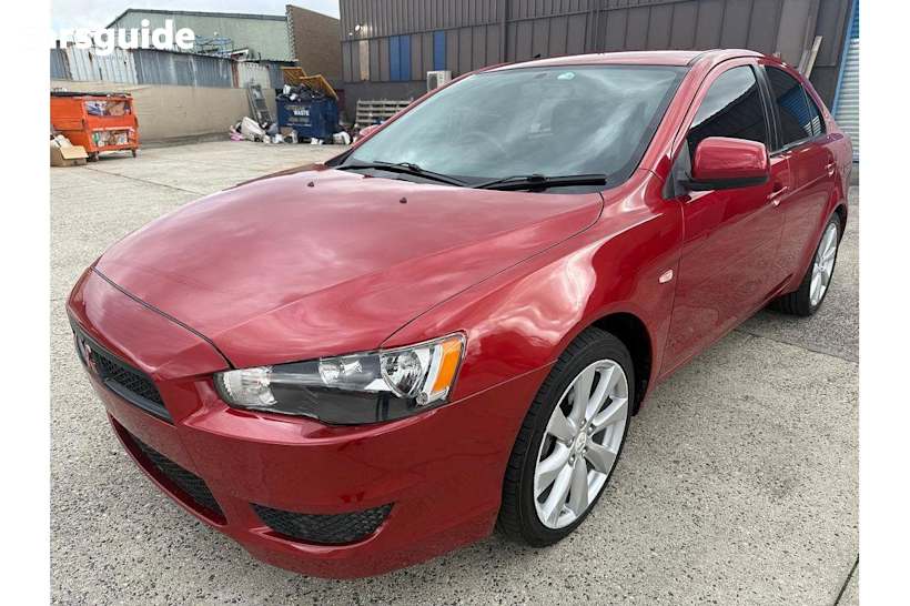 Red 2013 Mitsubishi Lancer Hatch ES F