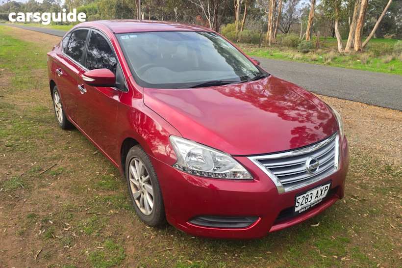 Red 2013 Nissan Pulsar Sedan St