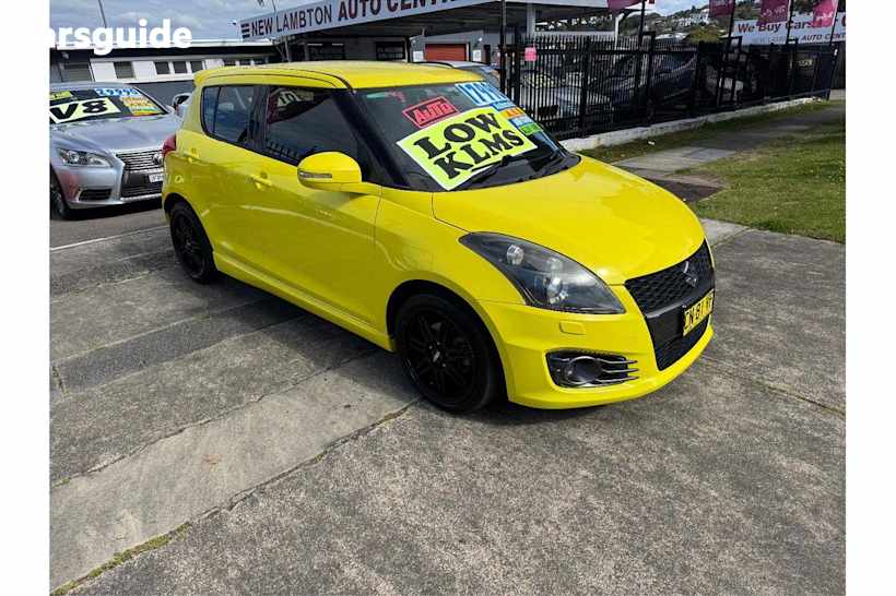Yellow 2015 Suzuki Swift Hatchback Sport