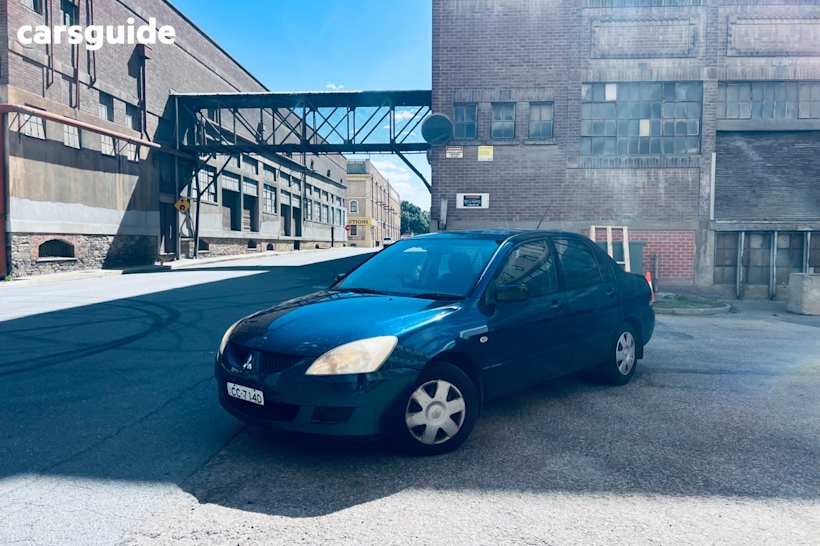 Blue 2003 Mitsubishi Lancer Sedan Es