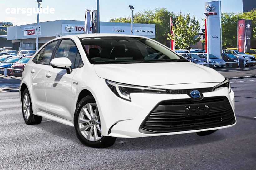 White 2024 Toyota Corolla Sedan ASCENT SPORT HYBRID F