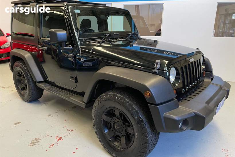 Black 2012 Jeep Wrangler Softtop Sport (4X4)