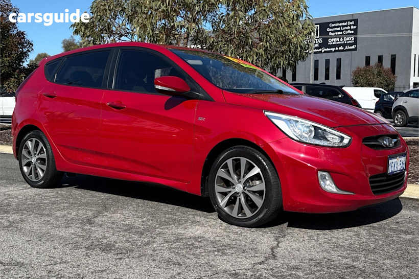 Red 2014 Hyundai Accent Hatch SR F