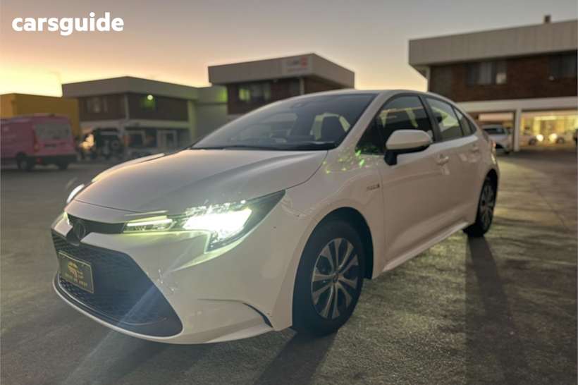White 2021 Toyota Corolla Sedan ASCENT SPORT HYBRID F
