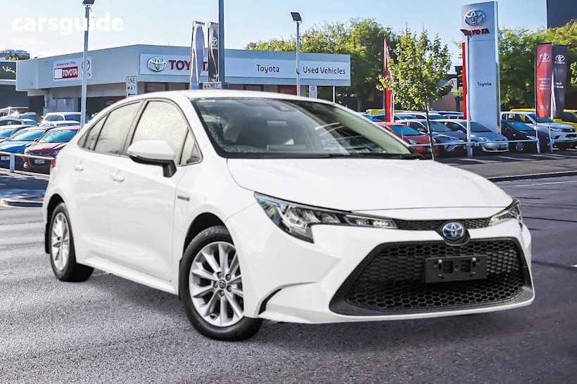 White 2021 Toyota Corolla Sedan ASCENT SPORT HYBRID F