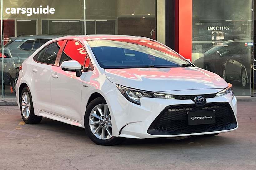 White 2022 Toyota Corolla Sedan ASCENT SPORT HYBRID F