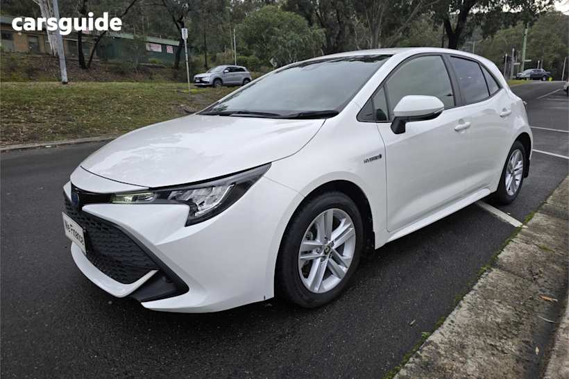 White 2021 Toyota Corolla Hatchback Ascent Sport Hybrid