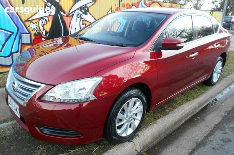 Red 2013 Nissan Pulsar Sedan St-L