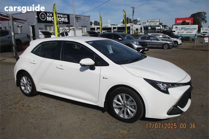 White 2024 Toyota Corolla Hatchback Ascent Sport Hybrid