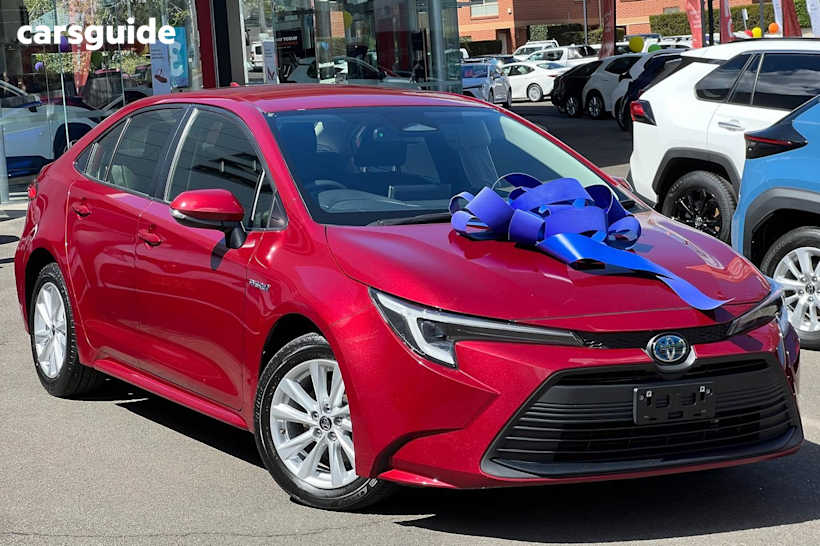 Red 2023 Toyota Corolla Sedan ASCENT SPORT HYBRID F