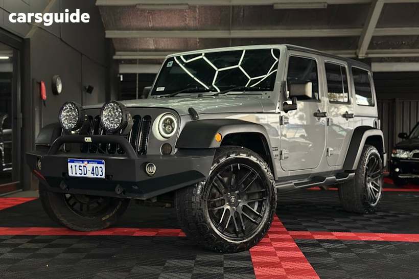Silver 2013 Jeep Wrangler Sedan UNLIMITED SPORT 4X4
