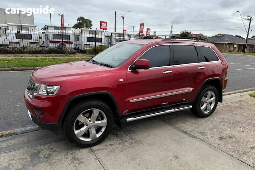 Red 2011 Jeep Grand Cherokee SUV OVERLAND 4X4