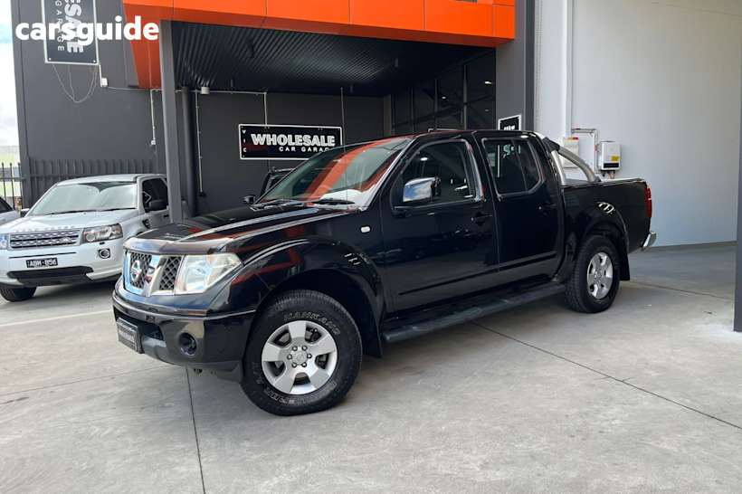 Black 2010 Nissan Navara Dual Cab Pick-up St (4X4)