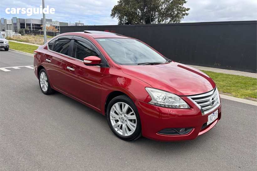 Red 2013 Nissan Pulsar Sedan Ti