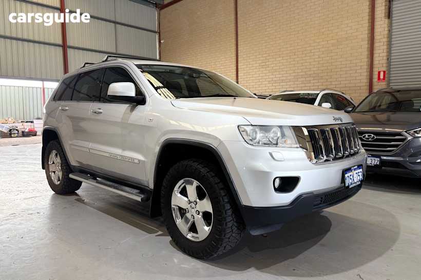 Silver 2011 Jeep Grand Cherokee SUV LAREDO 4X4