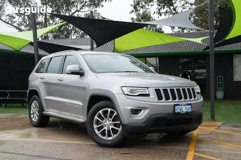 Silver 2015 Jeep Grand Cherokee SUV LAREDO 4X4