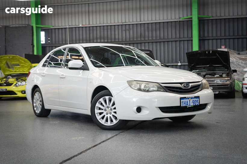 White 2010 Subaru Impreza Sedan R 4WD