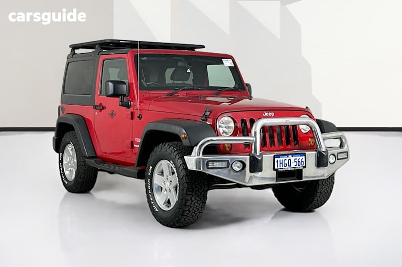 Red 2011 Jeep Wrangler Softtop Sport (4X4)