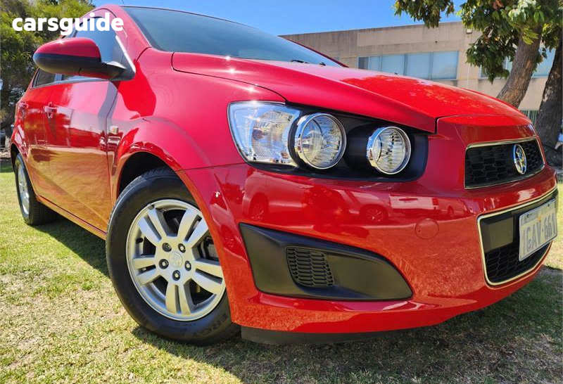 Red 2015 Holden Barina Sedan Cd