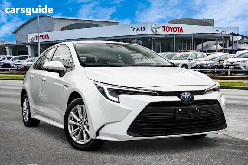 White 2023 Toyota Corolla Sedan ASCENT SPORT HYBRID F