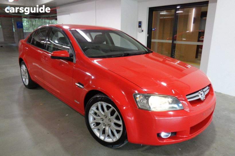 Red 2010 Holden Commodore Sedan International