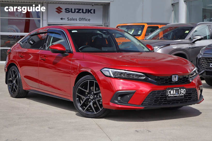 Red 2023 Honda Civic Hatch E:HEV LX F