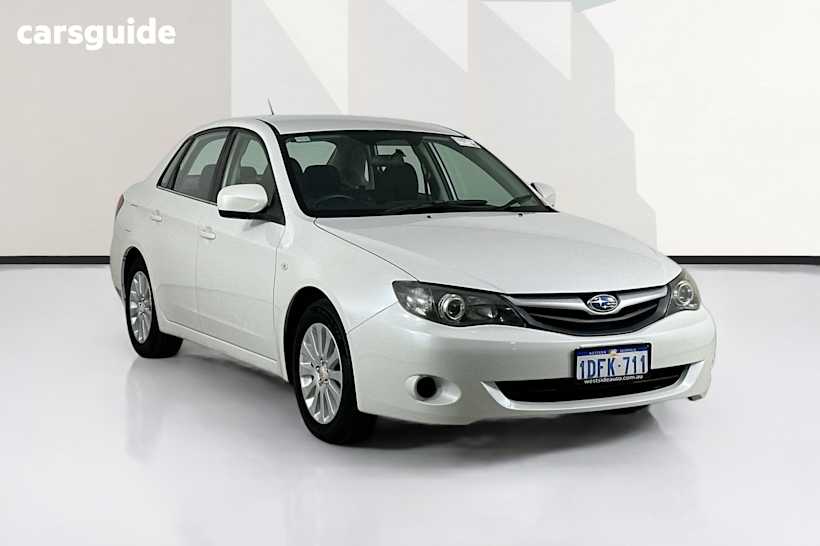 White 2010 Subaru Impreza Sedan R (Awd)