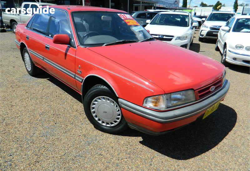 Red 1987 Ford Telstar Sedan GHIA F