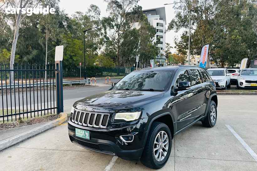 Black 2014 Jeep Grand Cherokee SUV LAREDO