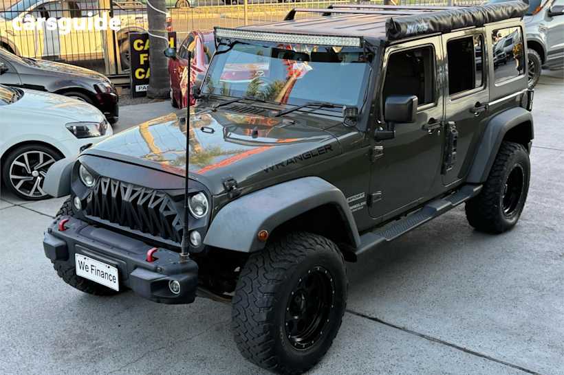 Green 2015 Jeep Wrangler Sedan UNLIMITED SPORT 4X4