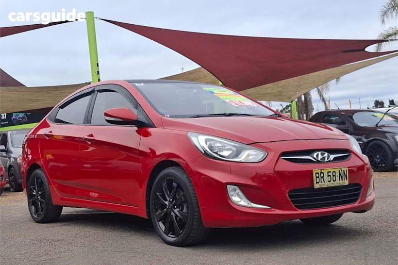 Red 2012 Hyundai Accent Sedan Premium