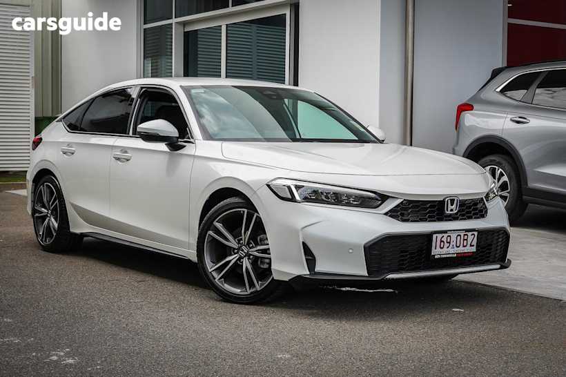 White 2024 Honda Civic Hatch E:HEV L F