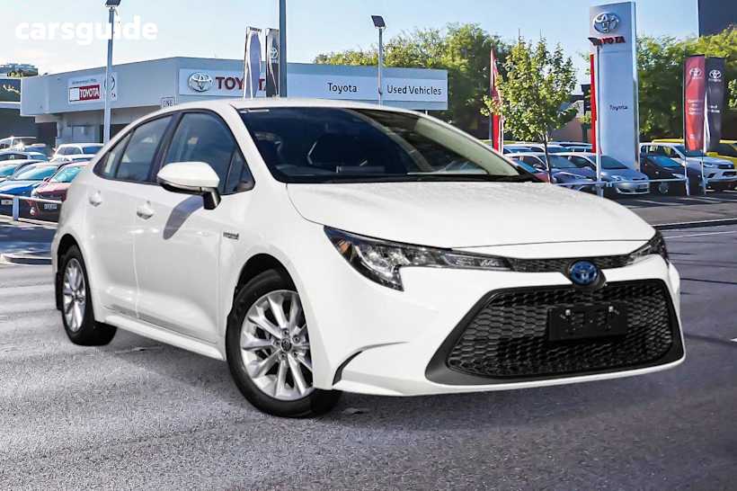 White 2021 Toyota Corolla Sedan ASCENT SPORT HYBRID F