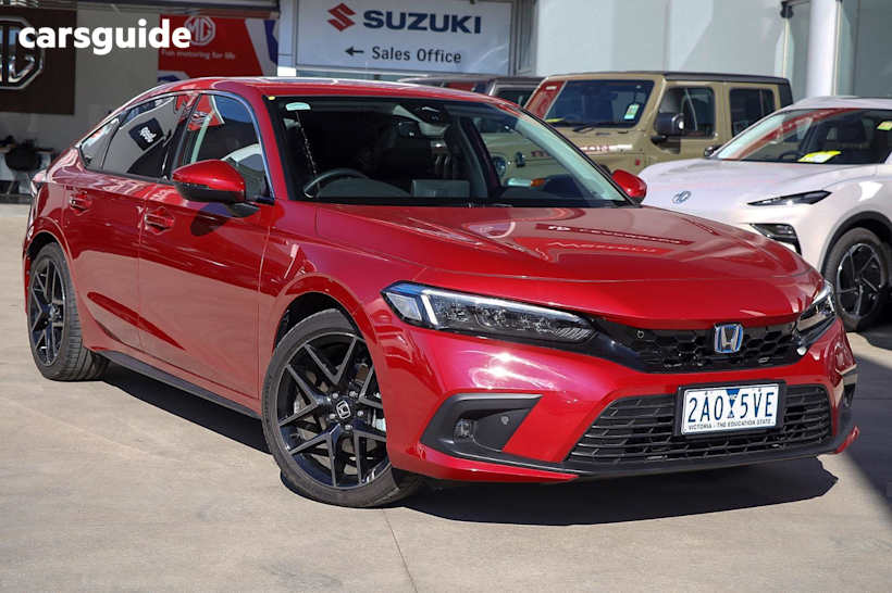 Red 2023 Honda Civic Hatch E:HEV LX F