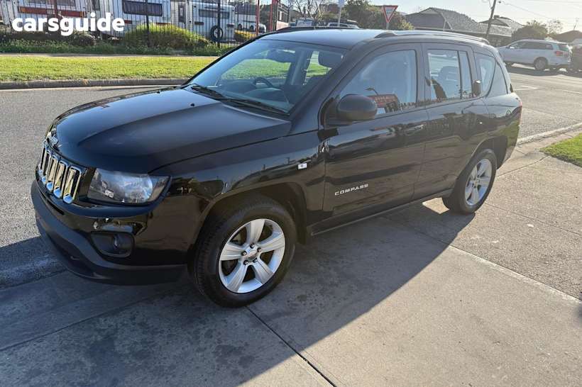 Black 2015 Jeep Compass SUV SPORT F