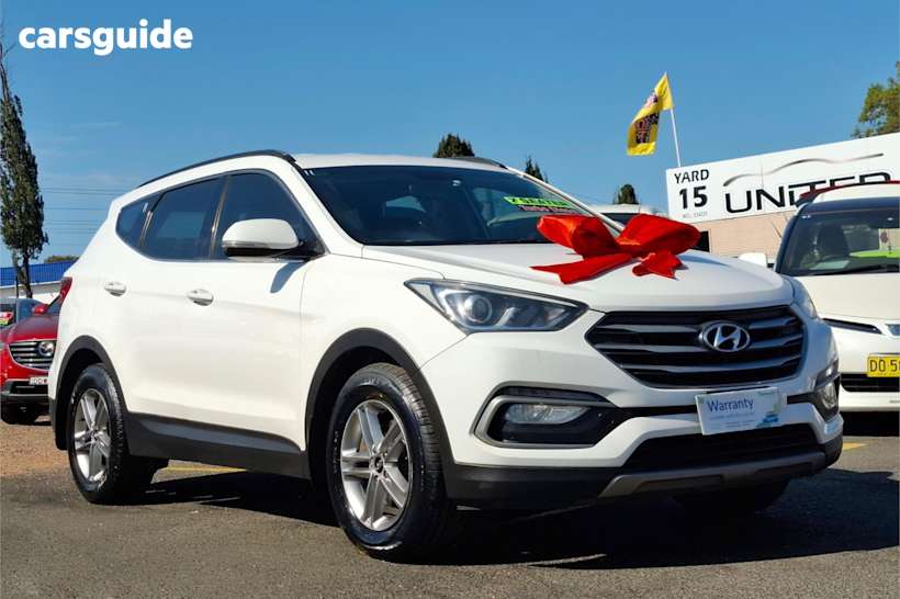 White 2016 Hyundai Santa FE SUV ACTIVE