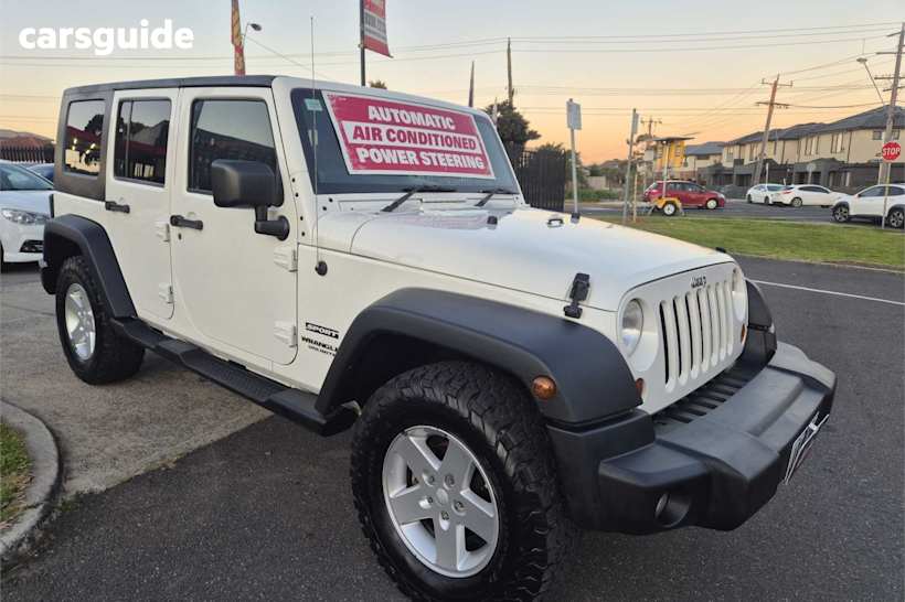 White 2009 Jeep Wrangler Softtop Unlimited Sport (4X4)