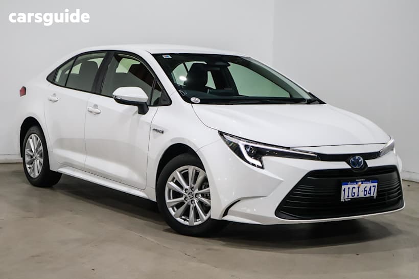 White 2024 Toyota Corolla Sedan ASCENT SPORT HYBRID F
