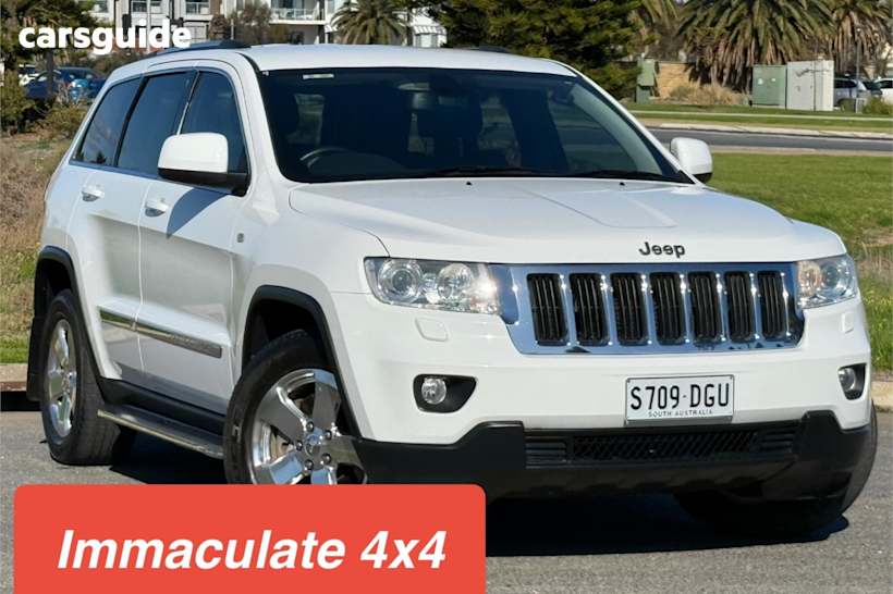 White 2013 Jeep Grand Cherokee SUV LAREDO 4X4