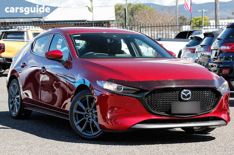 Red 2022 Mazda Mazda3 Hatch G20E EVOLVE M HYBRID F