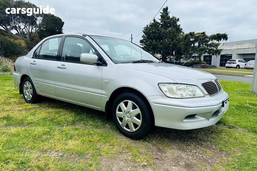Silver 2003 Mitsubishi Lancer Sedan LS F