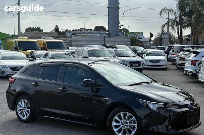 Black 2019 Toyota Corolla SUV TOURING HYBRID S