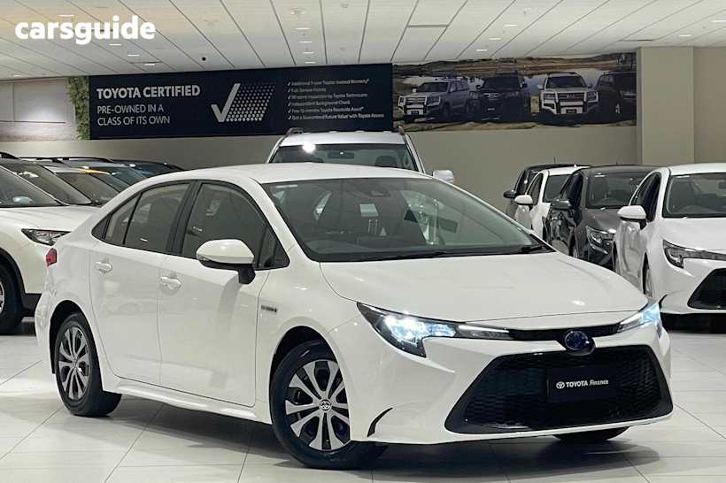 White 2021 Toyota Corolla Sedan ASCENT SPORT HYBRID F