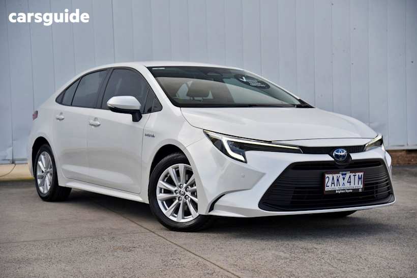 White 2024 Toyota Corolla Sedan ASCENT SPORT HYBRID F