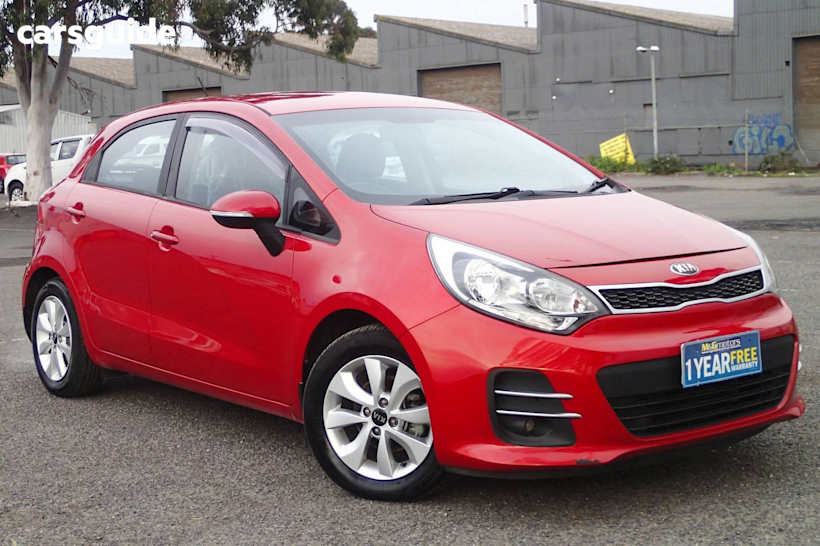 Red 2015 Kia RIO Hatchback Si