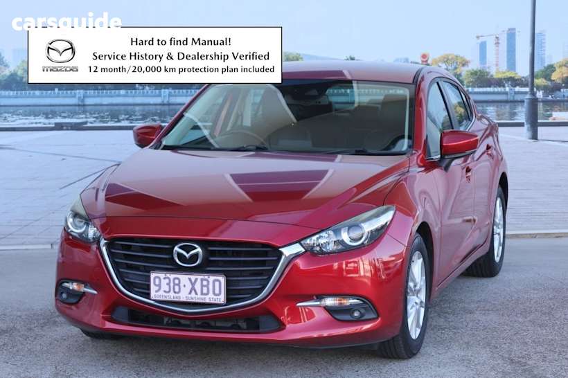 Red 2016 Mazda 3 Sedan Touring