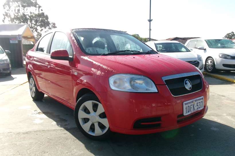 Red 2009 Holden Barina Sedan