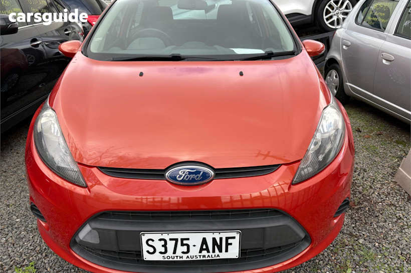 Orange 2011 Ford Fiesta Sedan LX F